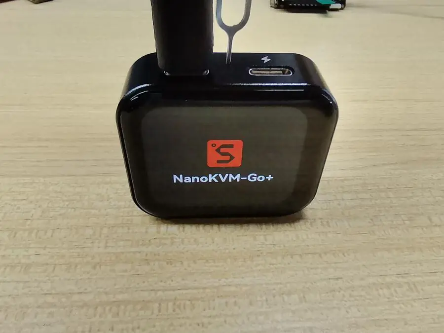 Hold Reset and connect the NanoKVM Go data port